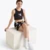 Jg. Crop Top Smile Logo Camiseta corta con logotipo – Niña